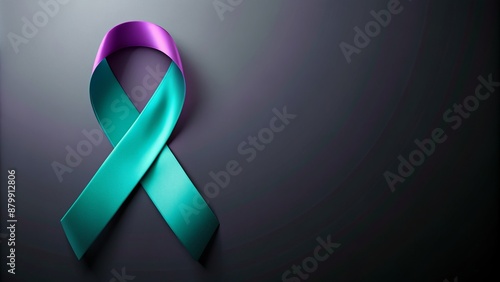 Isolated teal and purple ribbon entwined on a calm dark background, symbolizing hope and support for suicide prevention awareness.