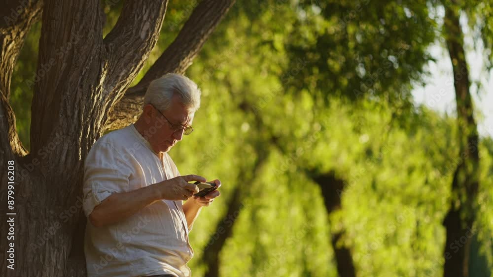 Elderly man tax pizztures in nature. Concept of leisure and retirement. Elderly man tax pizztures in nature. Concept of leisure and retirement.