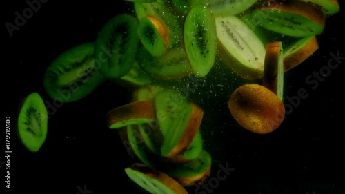 kiwi in the water on a black background