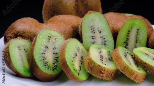 kiwi in the water on a black background