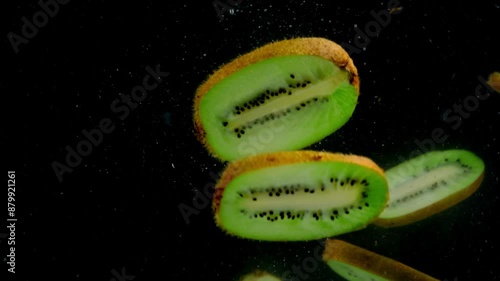 kiwi in the water on a black background