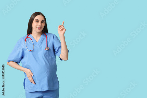 Smiling female doctor in bl...