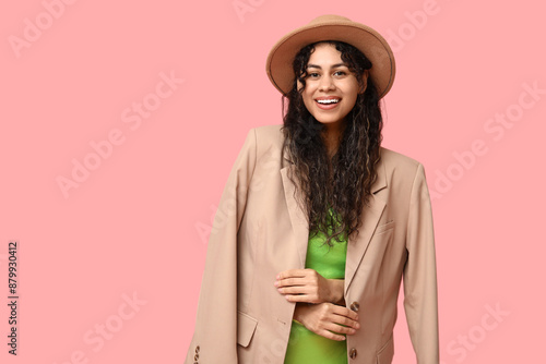 Smiling young woman with cu...