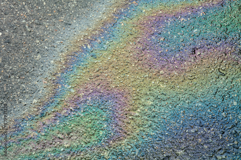 Obraz premium Gasoline on the asphalt, colored stains, abstract background.