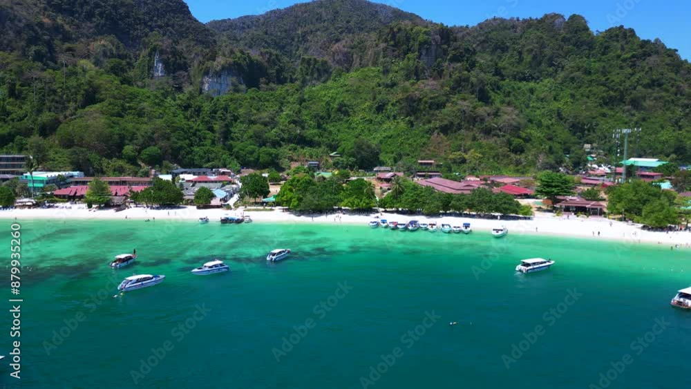 Tourists boats in turquoise water koh phi phi. Majestic aerial view flight drone