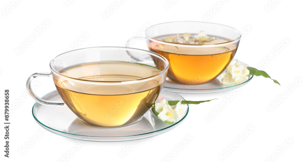 Aromatic jasmine tea in cups, flowers and green leaves isolated on white Aromatic jasmine tea in cups, flowers and green leaves isolated on white