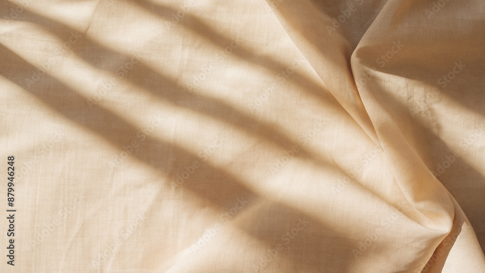 Fototapeta premium Soft Beige Linen Fabric with Natural Light and Shadows