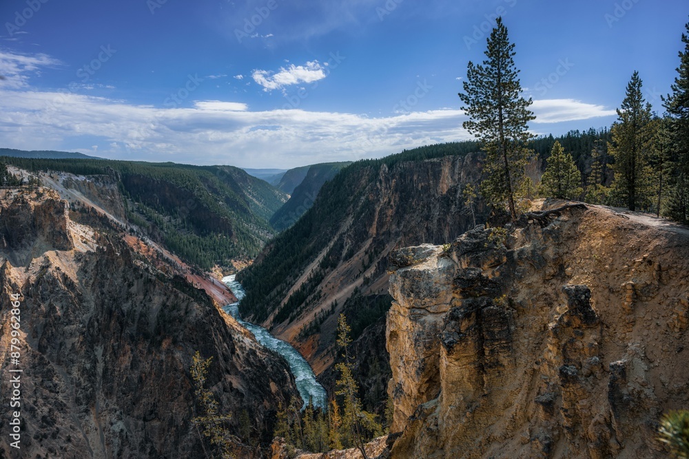 Stunning view of the Grand Canyon of the Yellowstone with a river flowing through it in Wyoming, USA Stunning view of the Grand Canyon of the Yellowstone with a river flowing through it in Wyoming, USA