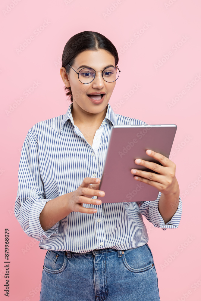 Brunette woman using digital tablet for internet browsing Brunette woman using digital tablet for internet browsing