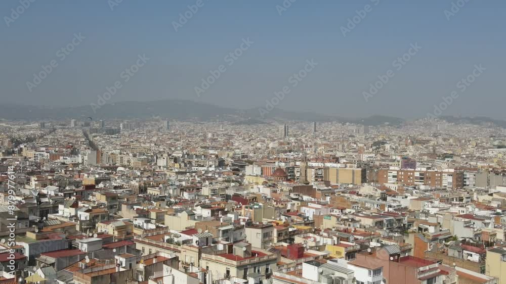 Aerial video above the buildings of the city of Barcelona, Europe Aerial video above the buildings of the city of Barcelona, Europe