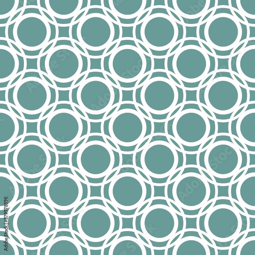Seamless circular geometric pattern on white on a green background.