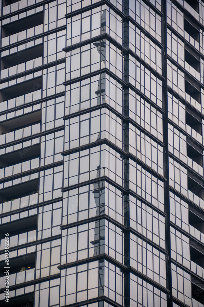Modern metal glass windows of a skyscraper in Jakarta. Modern metal glass windows of a skyscraper in Jakarta.