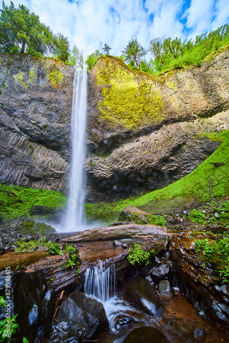 Latourell Falls Cascading Over Rugged Cliff with Lush Greenery Low Angle photo