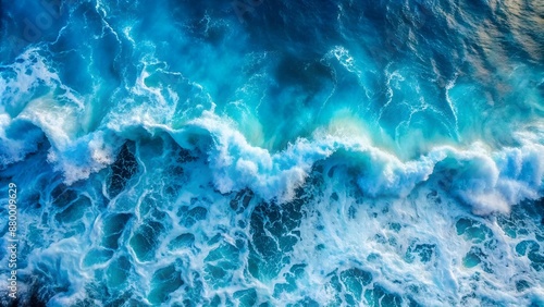 Top view on blue ocean waves. Nature background.
