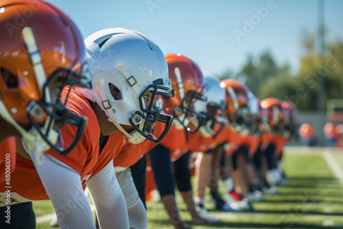 high school football team playing a football game in a high school football field, fall, football, sports, autumn. 