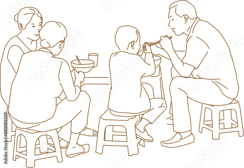 vietnamese people eating breakfast on the sidewalk
