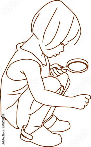 asian little girl exploring with magnifying glass at outdoor