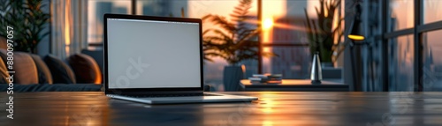 Sleek laptop on a wooden desk in a contemporary apartment with large windows showcasing a stunning sunset cityscape.