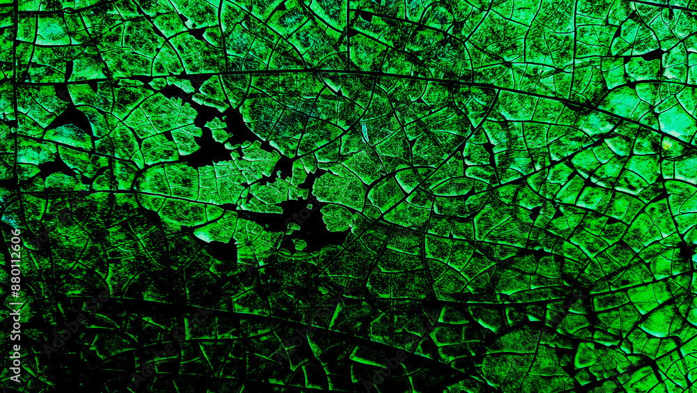 Fototapeta premium dark green cracked background