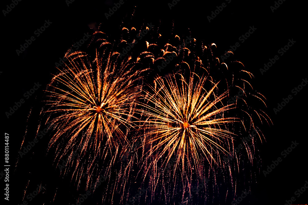 Montreal, Canada - June 27 2024: Fire works show with quarter moon in background at La Ronde in Montreal Montreal, Canada - June 27 2024: Fire works show with quarter moon in background at La Ronde in Montreal