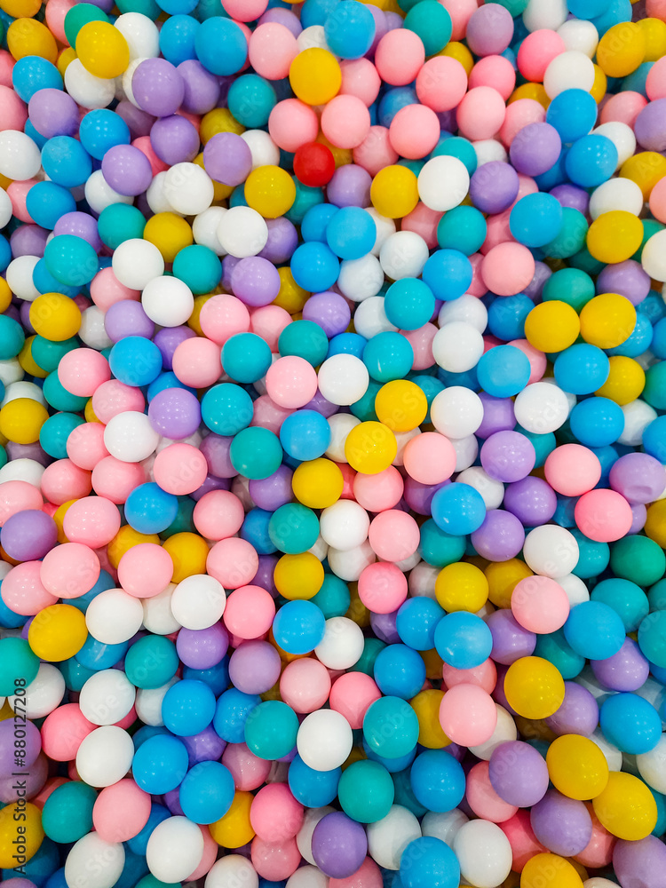 pile of colorful plastic balls on the children's playground, top view pile of colorful plastic balls on the children's playground, top view