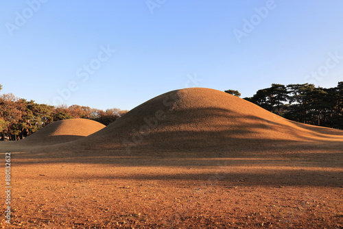 Autumnal and afternoon view of shadow on the grass of Oreung Royal Tomb at Tap-dong near Gyeongju-si, South Korea
 photo