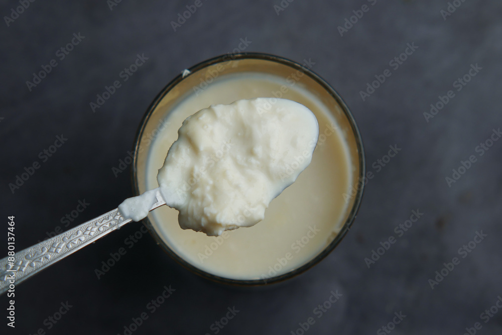 glass of whole cream milk on table , Cream of milk. glass of whole cream milk on table , Cream of milk.