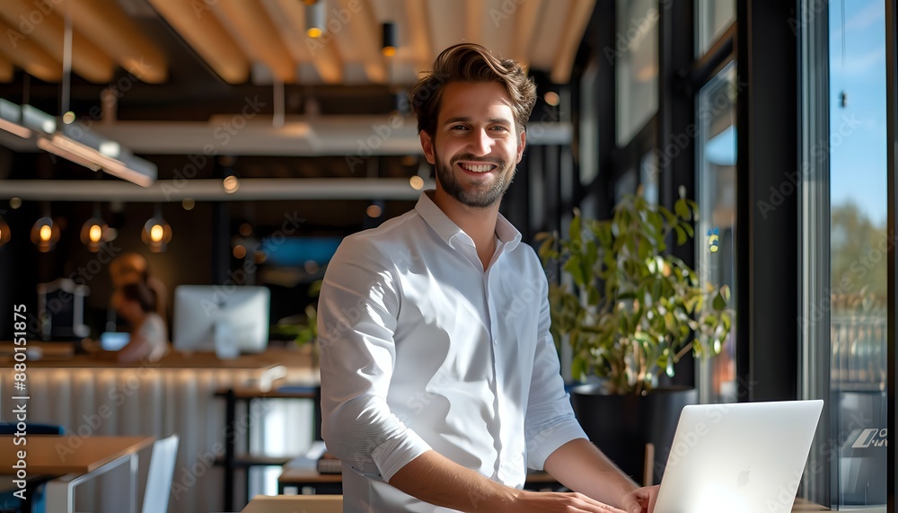 Confident businessman working on a laptop in a modern office. Confident businessman working on a laptop in a modern office.