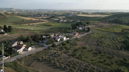 Wallpaper Mural aerial Sicily Italy olive tree plantation for olive oil production hills landscape with wind turbine at distance Torontodigital.ca