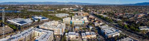 Aerial panoramic view of Main Street Cupertino residential and commercial neighborhood in San Francisco Bay Area, California. Looking toward downtown San Jose
