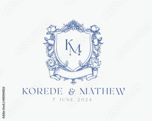 Wedding logo crests vector design royal style blue color illustration monogram crest design with KM initial surrounded by baroque style intricate motifs
