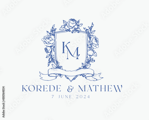 Wedding logo crests vector design royal style blue color illustration monogram crest design with KM initial surrounded by baroque style intricate motifs