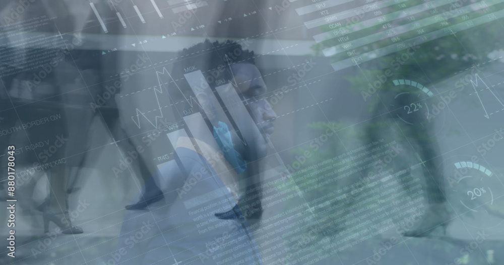 Image of data processing over diverse business people walking Image of data processing over diverse business people walking