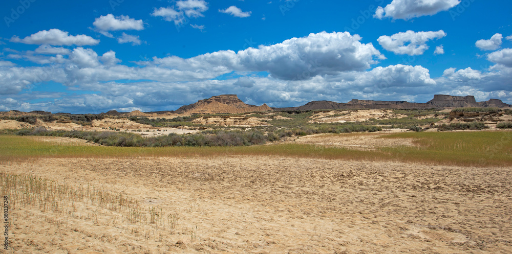 scenic view on Bardenas Reales desert in Spain under sky with nwhite clouds scenic view on Bardenas Reales desert in Spain under sky with nwhite clouds
