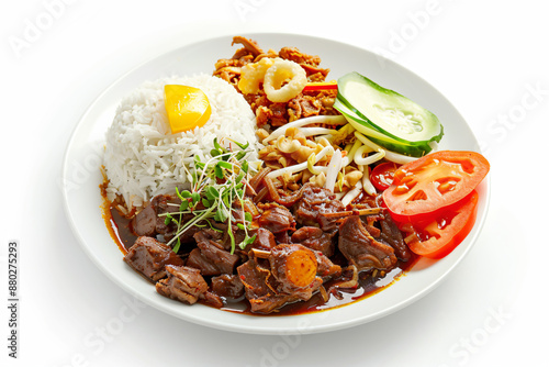 a plate of food with rice meat vegetables and a cucumber