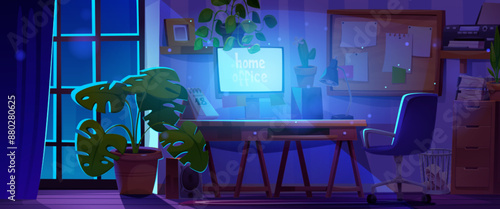 Desk for remote work at home in domestic room interior at night. Dark empty house office with computer monitor on table and chair, plants in pot and cabinet with papers, board with pinned notes.