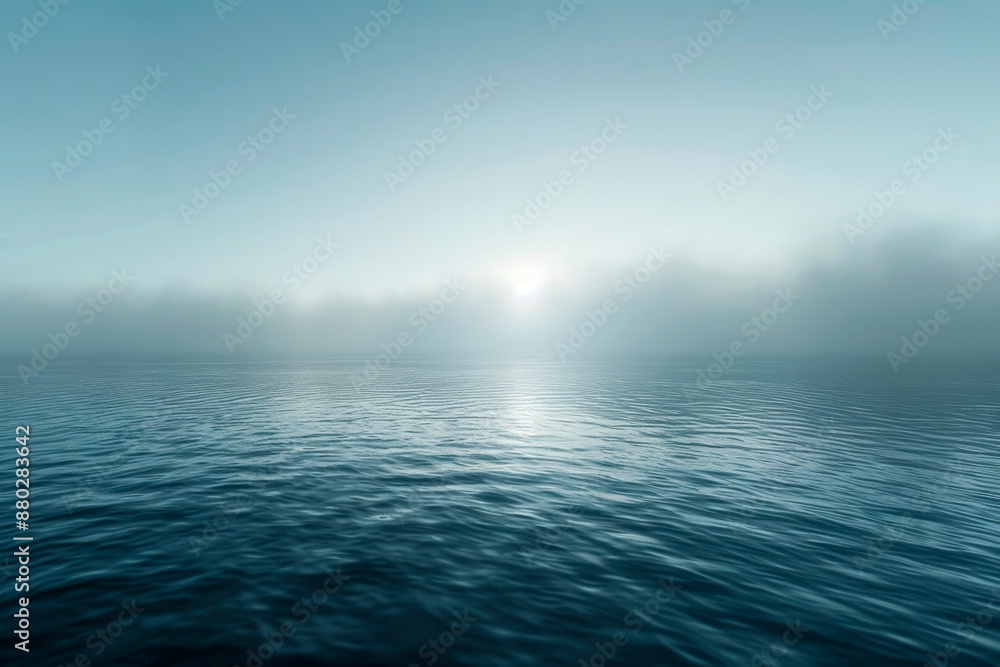 Obraz premium Serene Ocean Horizon Captured at Sunrise with Calm Waves and Clear Sky