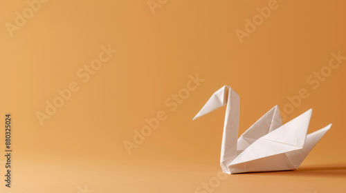 Fototapeta Naklejka Na Ścianę i Meble -  Graceful white origami swan and duck on beige backdrop, lit by natural sunlight in a serene setting.