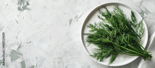 Plate with a bunch of fresh dill leaves, ideal for background with copy space image. photo