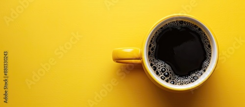Invigorating drink in a yel...