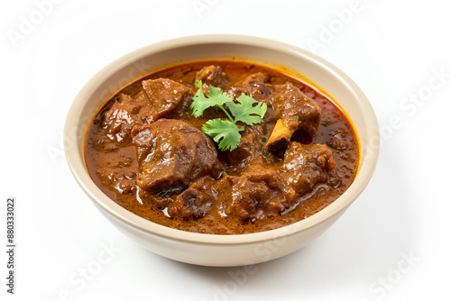 a bowl of stew with meat and a garnish