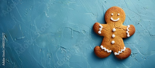 Gingerbread man on blue sur...