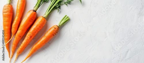 Carrot placed with a white ...