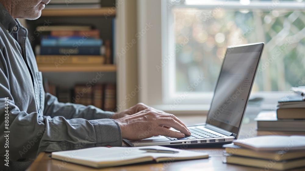 The man typing on laptop The man typing on laptop