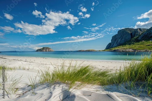 Seaside. Empty Sandy Beach with Bleiksoya Rock in Vesteralen Islands, Norway. Summer Travel Vacation in Tropical Ocean Landscape photo