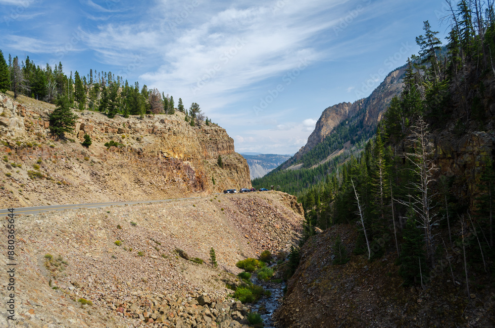 Obraz premium Golden Gate, With View of Valley, River, and Road at Yellowstone National Park