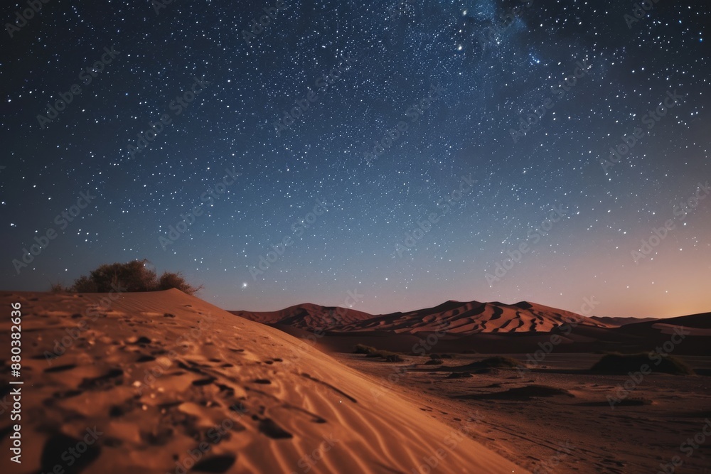 Obraz premium A vast desert landscape under a starry night sky, AI generated