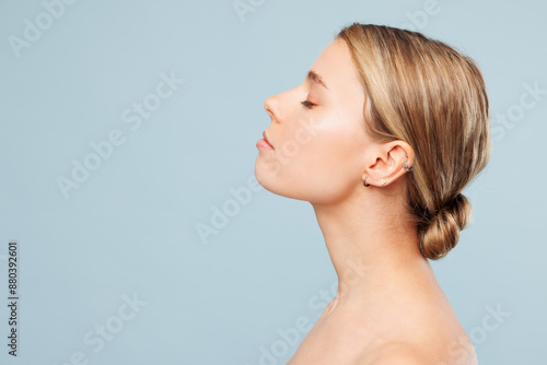 Konstfotografi Side profile view beautiful half naked topless young woman 20s with nude make up
