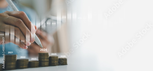Photos Woman Planning, Savings Money for Future and Smart Pencil with Arranging Coin Stacks