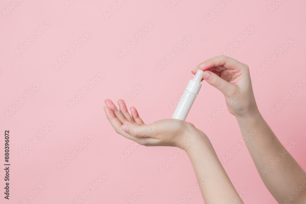 Glass unbranded bottle with serum or essential oil with pipette on gentle background. Presenting luxury skincare products Glass unbranded bottle with serum or essential oil with pipette on gentle background. Presenting luxury skincare products